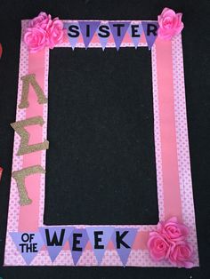 a pink and purple photo frame that says sister of the week with flowers on it