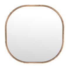 an oval wooden mirror on a white background