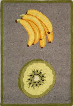 an area rug with bananas and kiwis on the top one has a green circle around it