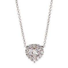 HC18496 METAL SPECIFICATIONS Metal Name : White Gold 14K STONE SPECIFICATIONS Stone Name : DIAMOND Stone Cut : Heart and Round cut Stone Specifications : There is one heart diamond in the necklace of approx. 2.00 carats and 12 smaller round diamonds 0.25 carats each (approx. dia 4.0 mm). Natural earth mined diamonds. Total Stone Weight : approx. 5.00 carats Color : F/G Clarity : VS2/SI APPRAISAL Appraised Value : $ 37384.00 Comes with Certificate Comes with 16" chain (can do a different chain le Ladies Necklace, Diamond Earrings Studs Round, Dainty Diamond Necklace, Heart Diamond, Round Diamond Engagement Rings, White Gold Diamond Rings, White Gold Jewelry, Natural Earth, Round Earrings