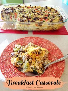 a red plate topped with a casserole covered in meat and vegetables next to a glass dish