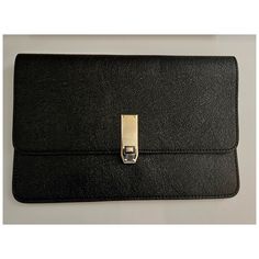 This Clutch Is The Perfect Size To Carry Comfortably And Large Enough To Hold What You Need. There Are Three Compartments And An Inside Zip Pocket. Silver Buckle Detail. Box 4 Black Everyday Clutch With Fold Over Clasp, Black Clutch With Fold Over Clasp For Everyday Use, Black Business Clutch With Magnetic Closure, Modern Black Clutch For Workwear, Black Office Clutch With Magnetic Closure, Black Business Bags With Fold Over Clasp, Versatile Black Clutch For Office, Black Envelope Clutch For Formal Occasions, Black Versatile Clutch For Office