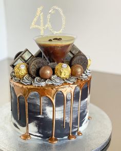 a birthday cake with chocolate and candy on top is decorated with the number forty four