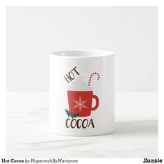 a white coffee mug with hot cocoa on it