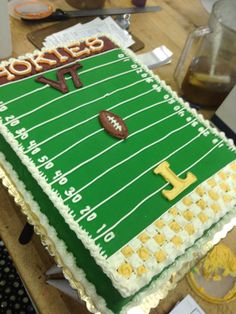 a football field cake is sitting on a table