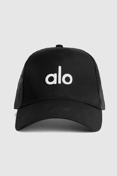 The elevated version of your classic cap, our District Trucker Hat has an Alo embroidered logo and mesh back with adjustable snap closure. Embroidered logo patch Mesh detail Adjustable snap back closure Alo Hat, Trucker Hat Outfit, Womens Onesie, Workout Tights, Mens Gear, Tank Top Bras, Womens Capris, Outfits With Hats, Snap Back