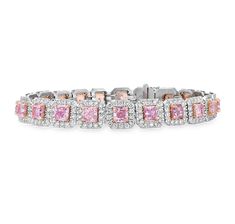 Pink diamonds are among the most sought-after gemstones in the world, celebrated for their rarity and the natural beauty of their color. This magnificent line bracelet comprises 20 dazzling pink natural diamonds—the pinnacle of luxury in a classic design. Each of these gems is certified by the GIA as natural fancy pink, with accompanying hues ranging from purple to orange, collectively weighing 6.47 carats. Complementing the pink diamonds are 3.01 carats of pristine white diamonds, creating a da Luxury Pink Gold Fine Jewelry Bracelets, Luxury Fusion Jewelry For Promise, Luxury Pink Tennis Bracelet For Formal Occasions, Luxury Pink Tennis Bracelet In Fine Jewelry Style, Luxury Pink Jewelry For Festive Season, Luxury Pink Jewelry With Baguette Diamonds, Luxury Mother's Day Jewelry With Diamond Accents, Luxury Pink Sapphire Fine Jewelry Bracelet, Pink Diamond Bracelet