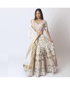 in stock Elegant Lehenga With Floral Embroidery In Traditional Drape, Elegant Silk Lehenga With Floral Embroidery, Elegant Lehenga With Floral Embroidery, Elegant Raw Silk Lehenga With Floral Embroidery, Elegant Designer Lehenga With Gold Embroidery, Elegant Embroidered Silk Lehenga, Elegant Formal Lehenga With Gold Embroidery, Silk Choli With Floral Embroidery For Wedding, Silk Sets With Multicolor Embroidery For Wedding