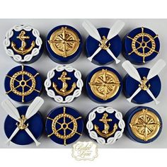 twelve royal blue and white buttons with gold trimmings, each decorated with an anchor