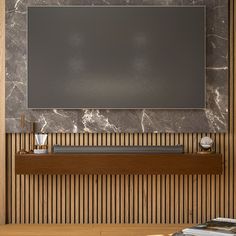 a tv mounted to the side of a wooden wall