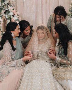 the bride and her friends are getting ready to be married