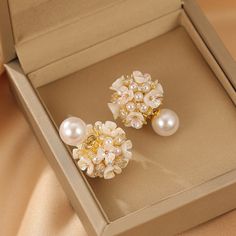 ✦ Indulge in the romance of our elegant stud earrings adorned with a delicate flower pearl design, perfect for adding a touch of grace to your wedding ensemble or elevating your bridesmaid look. Crafted with meticulous detail, these earrings encapsulate the essence of romance, making them an ideal choice for those special occasions. The timeless appeal of the flower pearl design adds a subtle and sophisticated charm, making these earrings a versatile accessory for various elegant events. Whether Rose Gold Flower Earrings With Pearl Drop For Wedding, Rose Gold Pearl Drop Flower Earrings For Wedding, Feminine Pearl White Drop Bridal Earrings, Feminine White Pearl Earrings For Evening, Pearl Drop Flower-shaped Bridal Earrings, Feminine Pearl White Pearl Earrings For Party, Formal Pearl White Flower Drop Earrings, Formal Pearl White Flower Earrings, Formal Pearl White Flower Earrings With Pearl Drop