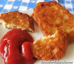 some food that is on a plate with a blue and white checkered table cloth