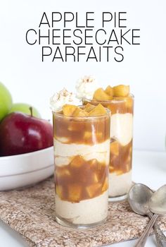 apple pie cheesecake parfaits in two glasses with spoons on the side