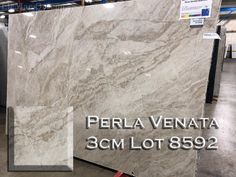 marble is displayed in a store with the words perla venata 3cm lot 8592