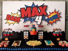 a table topped with cake and cupcakes next to a sign that says max