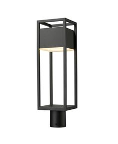 a black post light with a white light on it's top and bottom corner