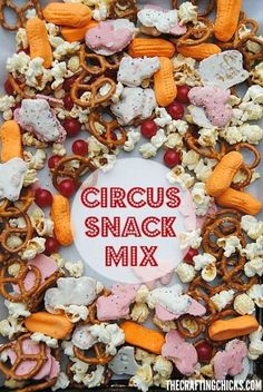 a box filled with lots of different types of snacks and pretzels next to the words circus snack mix