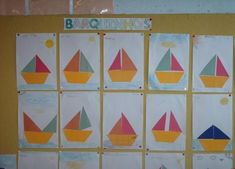 a bulletin board with paper boats on it