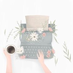 two hands are typing on an old typewriter with flowers and leaves around it, next to a cup of coffee