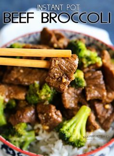 beef and broccoli stir fry in a bowl with chopsticks over rice