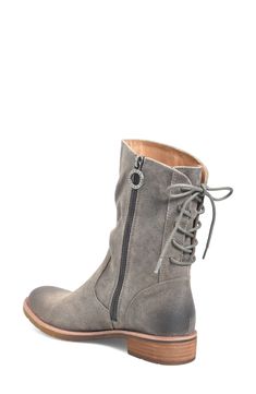 Keep feet cozy without sacrificing style or comfort in a low-heel boot fit with a cushioned footbed and finished with lace-up details at the back. 1 1/2" heel; 8" shaft Side zip closure; lace-up back Cushioned footbed with arch support Leather upper and lining/synthetic sole Imported Winter Lace-up Boots With Removable Insole, Fall Lace-up Boots With Suede Lining, Lace-up Suede Boots With Cushioned Footbed, Casual Leather Lace-up Boots With Low Heel, Casual Low Heel Lace-up Boots For Fall, Lace-up Boots With Removable Insole Medium Width, Fall Season Cushioned Ankle Lace-up Boots, Fall Lace-up Ankle Boots With Cushioned Footbed, Fall Lace-up Boots With Cushioned Footbed