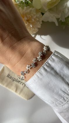 SIZE Any size for all, please leave a note when placing and order If note not left, then the sizes will be as below:  Bracelet 16cm + 2.5 cm extension OCCASION   Our jewellery is the perfect example of what it means - simple but beautiful!  Perfect for any occasion any time, any day!  DELIVERY We have added many options for the delivery, please choose appropriately: United Kingdom *Royal Mail 2nd class (Standard Delivery) and should be delivered within 2-3 business days, including Saturdays (NO Silver Beaded Bracelets With Flower Charm, Silver Flower Jewelry For Friendship, Silver Flower Crystal Bracelet As Gift, Silver Flower Crystal Bracelet Gift, Silver Flower Crystal Bracelet For Gift, Silver Beaded Bracelets With Flower Charm As Gift, Adjustable Delicate Beaded Bracelets With Flower Charm, Adjustable Flower-shaped Jewelry With Faceted Beads, Adjustable Flower-shaped Faceted Beads Jewelry