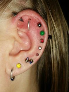 a girl with some piercings on her ear