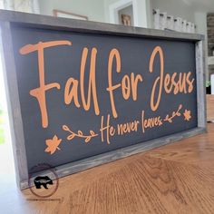 a sign that says fall for jesus he never leaves