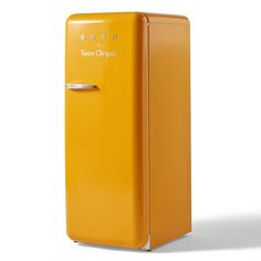 an orange refrigerator with the door open on a white background and no one around it