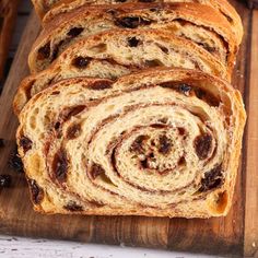 sliced bread with raisins on a cutting board