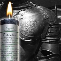 a candle that is lit next to a knight's armor and helmet with the words protection written on it