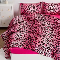 a pink and black leopard print comforter set