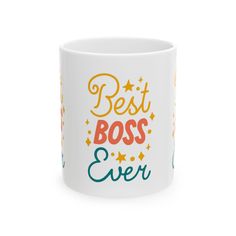 a white coffee mug with the words best boss ever on it and stars around it