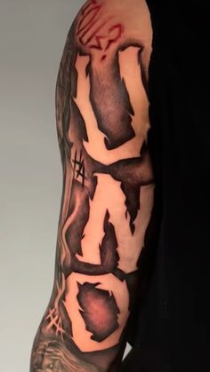 a man's arm with some ink on it