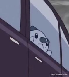 a cartoon character sitting in the drivers seat of a car with his head out the window