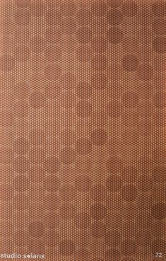 an orange and brown wallpaper with circles on the bottom, in shades of red