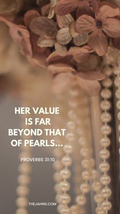 pearls are hanging from the ceiling with a quote above it that reads her value is far beyond that of pearls