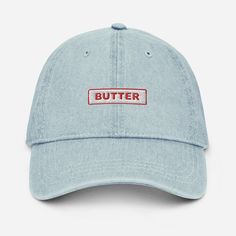 The Butter Stick Dad Hat features a minimal stick of butter embroidered on the front. Not the loudest hat in the world, but will add tremendous taste to any fit. Just like butter. Made out of 100% cotton, the 6-panel cap offers a light feel, while the adjustable strap ensures a solid and comfortable fit. * 100% cotton * 6-panel unstructured cap with a low profile * Soft crown *  6 sewn eyelets  * 4 rows of visible stitching on the visor * Adjustable strap * Head circumference: 21.65″-25.19″ (55 cm-64 cm) * Blank product sourced from China This product is made especially for you as soon as you place an order, which is why it takes us a bit longer to deliver it to you. Making products on demand instead of in bulk helps reduce overproduction, so thank you for making thoughtful purchasing deci Spring Cotton Hat With Logo Patch, Spring Cotton Trucker Hat With Flat Bill, Cotton Hats With Logo Patch, Cotton Flat Bill Fitted Hat, One Size, Basic Six-panel Cotton Hat, Cotton Trucker Hat With Logo Patch And Curved Brim, Cotton Hat With Logo Patch And Curved Bill, Cotton Curved Bill Hat With Logo Patch, Vintage Cotton Dad Hat With Flat Bill