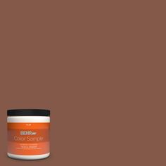 the behr paint color sample is shown in an orange, green and black hue