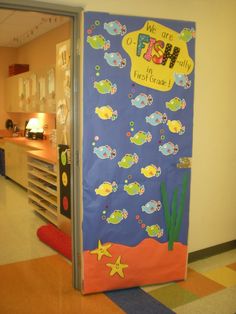 a classroom door decorated with fish and seaweed