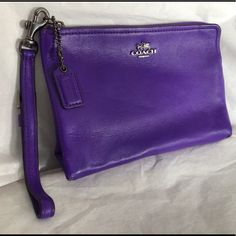 Coach Legacy Violet Zip Wristlet Multipurpose Bag. Never Used For Makeup, Just Organized Misc. Items In Purse. You Could Use It As An Alternative To A Purse. 2 Cc Slots Inside, Wristlet Strap On Exterior. Minor Wear On Bottom Corners From Being Inside Other Bag Chic Pouch Bag With Wrist Strap, Everyday Handheld Bags With Wrist Strap, Chic Handheld Bag With Wrist Strap, Everyday Handheld Bag With Wrist Strap, Purple Clutch For Travel, Leather Bags With Wrist Strap For On-the-go, Trendy Purple Pouch Clutch, Leather Bags With Wrist Strap, Purple Travel Pouch