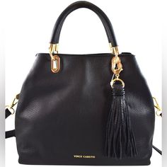 Retail: $248 + Tax. Vince Camuto Satchel/Shoulder Bag Style: Elva Color: Black Dimension: 12 In (Middle Width) X 10 In (Height) X 5 In (Depth) Handle Is 4 Inches Drop. A Longer, Detachable Shoulder Strap Is Included. Bag Features: . Material: Genuine Leather. Goldtone Hardware. Magnetic Snap Main Closure. Tassel Pendant Is Included. . Interior Lined With Nylon. Interior Has A Middle Zipped Compartment, A Side Zipped Pocket, A Wallet Pocket And A Cellphone Pocket. Vince Camuto Bag, Bag Style, In Depth, Vince Camuto, Top Handle, Fashion Bags, Zip Pockets, Crossbody Bag, Satchel