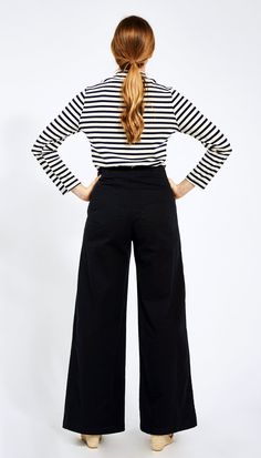 The Long Sabrina Pants are the high waisted flattering pants you need in your life! We cut these to flatter your waist and butt, with front and back pockets. Made from washed stretch Black twill and featuring wide belt loops and side zipper closure. FIT NOTE: The measurements below are of the actual pants. These are made with stretch fabric and will fit up to 2" bigger if needed as they will stretch to fit your body. If you want a tight snug fit, we suggest buying these in the smallest size that Fall Workwear Bottoms With Five Pockets, Relaxed Fit High Waist Chinos For Fall, High Rise Cotton Pants For Fall, Stretch Cotton Wide Leg Chinos, Wide Leg Stretch Cotton Chinos, Versatile High-waist Bottoms For Fall, Versatile High Waist Bottoms For Fall, Versatile Cropped Leg Pants With Five Pockets, High-rise Pants With Loosely Fitted Hips For Fall