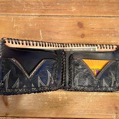 "I've taken a vintage black leather cowboy boot and turned it into a one of a kind wallet. Insert is genuine leather. Places for ID,credit cards, and cash. Hand stitched and crafted. Vintage and handmade items will not be perfect but I try to capture any flaws in photos. Would make a great gift for the cowboy or cowgirl in your life! Length open: 9 1/2\" Length folded: 5\" Width: 4\"" Cowboy Boot Wallet, Vintage Leather Bifold Wallet, Western Leather Wallet, Boot Wallet, Western Style Brown Trifold Wallet With Card Slots, Black Leather Cowboy Boots, Hand-stitched Black Leather Wallet, Tony Lama, Vintage Cowboy Boots