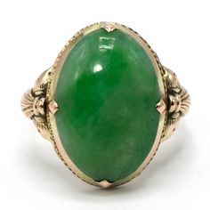 This lovely ring—probably made in the 1920s—is made of gold fill and is replete with elegantly simple Arts & Crafts design elements. The central stone is an oval piece of verdant nephrite jade. Metal: Gold Fill Main Stone: 1 Oval Cut Cabochon Jade (nephrite, 16.11 x 11.36 mm) Ring Size: 6.0 (can be sized) Simple Arts, Easy Arts And Crafts, Art And Craft Design, Nephrite Jade, Jade Ring, Lovely Ring, Simple Art, Design Element, Oval Cut