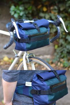 two bags are attached to the back of a bicycle