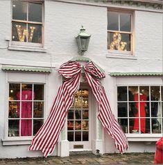 a large bow on the side of a building