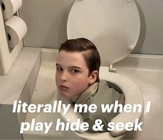 a boy sitting in a toilet with the words literally me when i play hide and seek