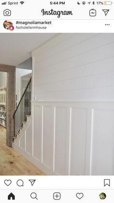 an instagram photo of a house with white walls and wood floors, along with the stairs leading up to the second floor